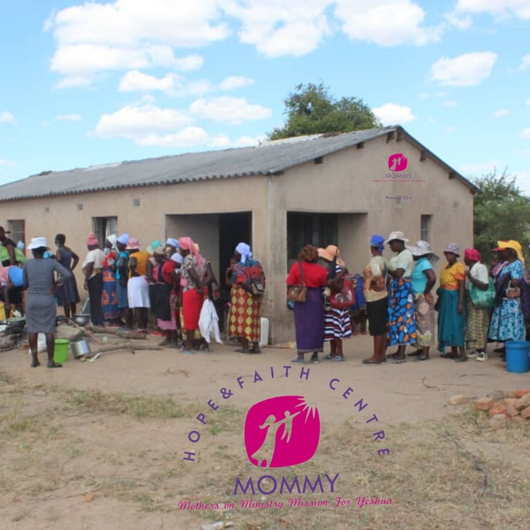 Community gathering outside Hope and Faith Community Centre in Bocha, Mutare